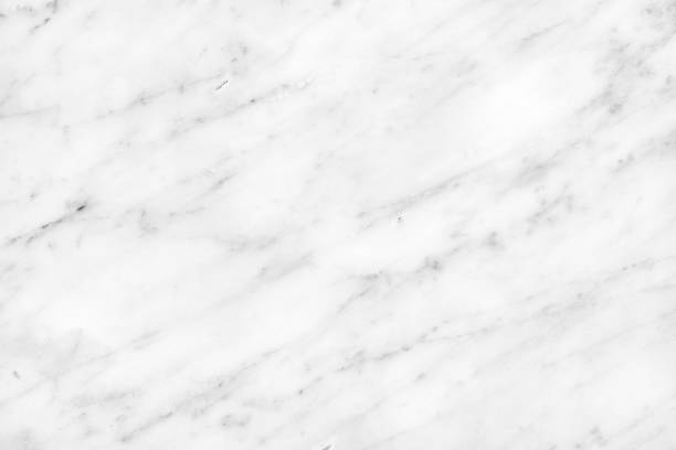 istock White Carrara Marble natural light surface for bathroom or kitchen countertop 1072432960