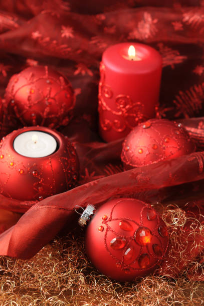 istock Christmas decoration with red table cloth and red candle burning 1072435098