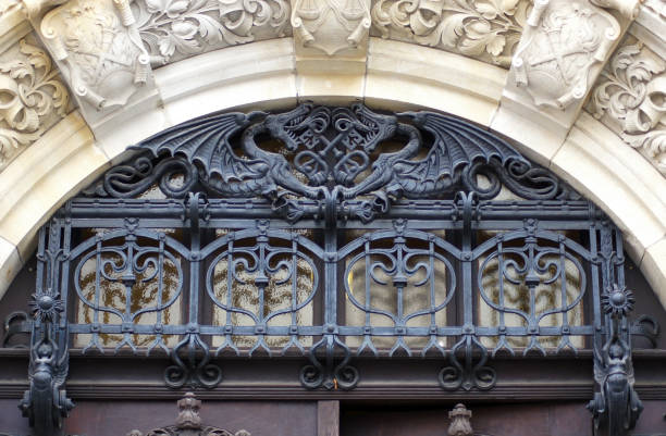 istock Forged iron grids in front of glass window 1072437918