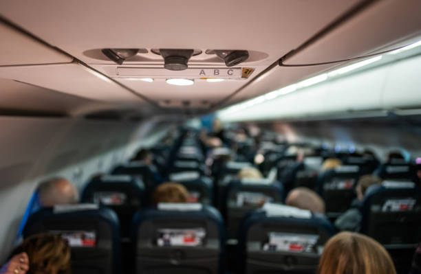 istock High angle view of airplane passenger cabin. 1072439134