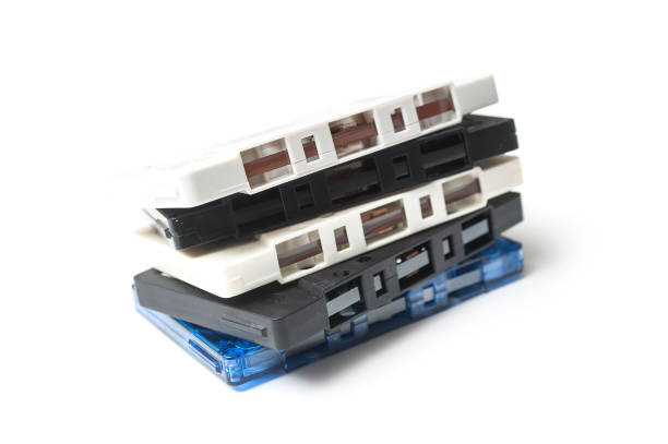 istock vintage audio cassette pile on white background 1072442994