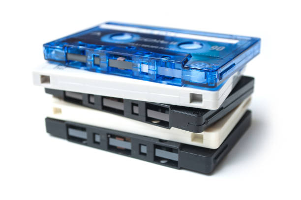 istock vintage audio cassette pile on white background 1072447244