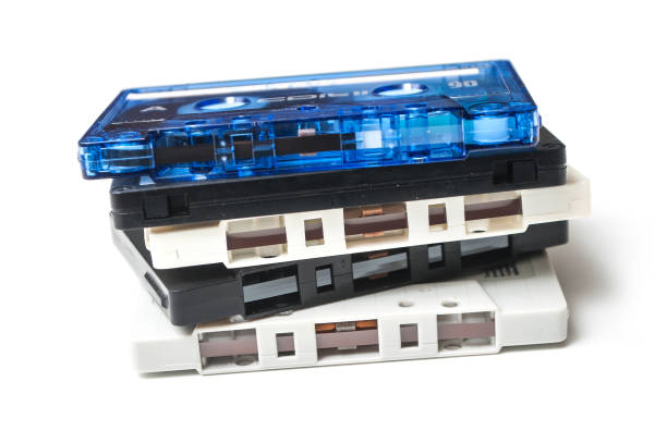 istock vintage audio cassette pile on white background 1072455418