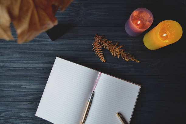 istock Notebook on the wooden desk with place for text. Stylish workplace background. Workplace design. 1072459880