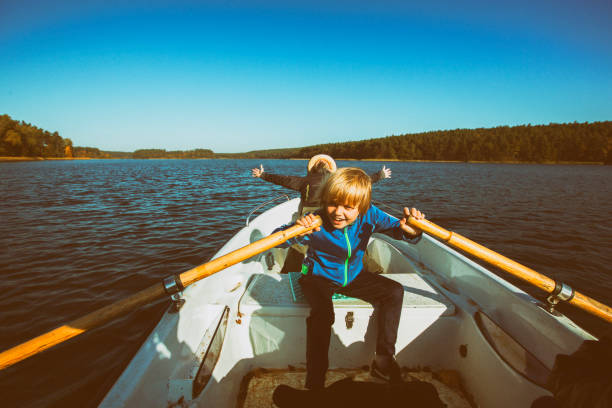 istock Father and son kayaking on a lake 1072462142