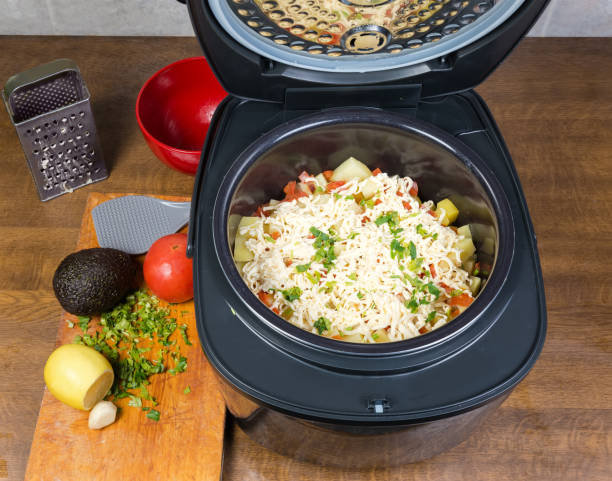 istock Vegetables braised in household multi-cooker sprinkled with grated cheese 1072462788