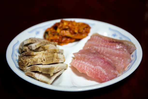 Hongeo Samhap - Fermented Skate and Steamed Pork Slices Served with Kimchi
