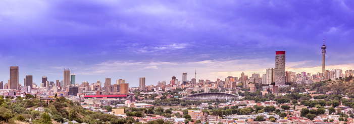 Johannesburg panoramic under storm clouds, seen from the Carlton tower to telkom communication tower in Hillbrow.\nJohannesburg, also known as Jozi, Jo'burg or eGoli, \