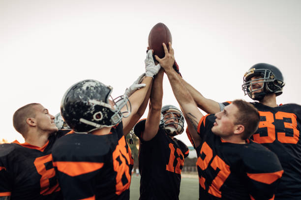 istock American football team unity 1072478586