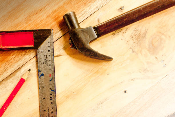 istock Solid Square and wood pencil and hammer for carpenter on wooden background tool woodcraft object isolated 1072480558
