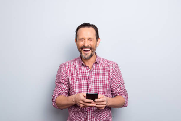 istock Attractive handsome good-looking close eyes from pleasure hold c 1072492636