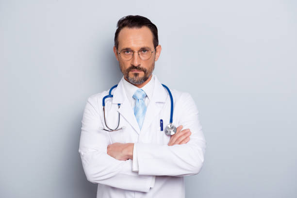 istock Portrait of handsome good-looking attractive man with stethoscop 1072492762