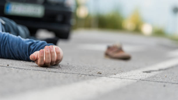 istock Traffic accident.Young man hit by a car 1072494050