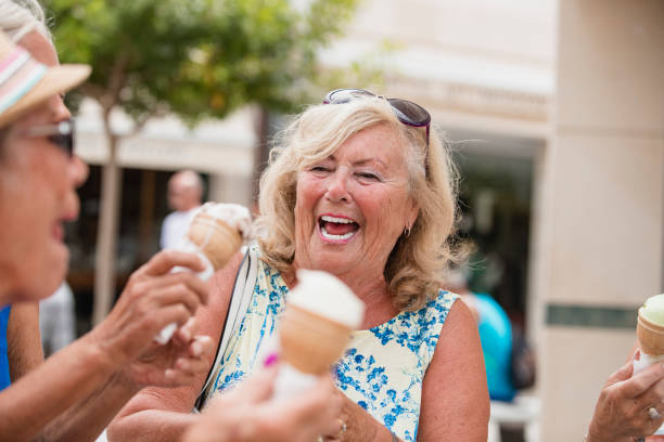 istock Fun Loving Seniors Eating Ice Cream 1072496560