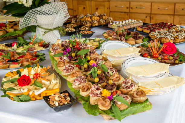 istock Close up of small canapes arranged on a plate over light background - selective focus 1072496772