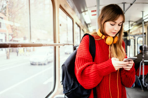 istock Young woman riding in public transportation 1072497078