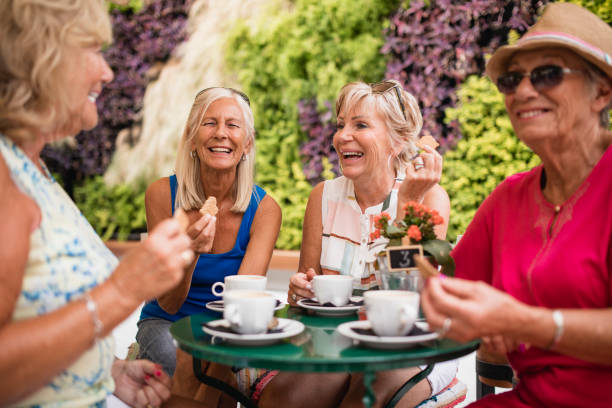 istock Senior Women Chatting in a Cafe 1072497478