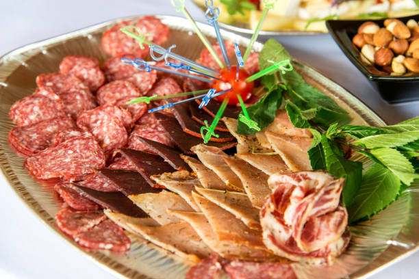 Selection display of cold meat salad food at a luxury restaurant buffet bar area