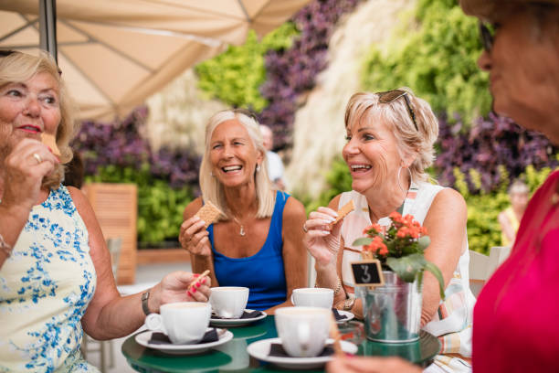 istock Senior Women Chatting in a Cafe 1072497546