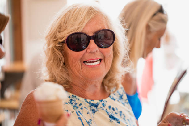istock Senior Women Buying Ice Cream 1072497780
