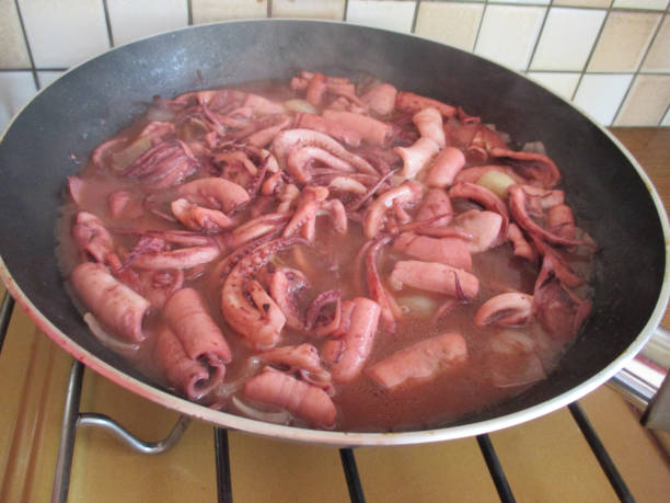 istock Squid in cooking with a sauce 1072500104