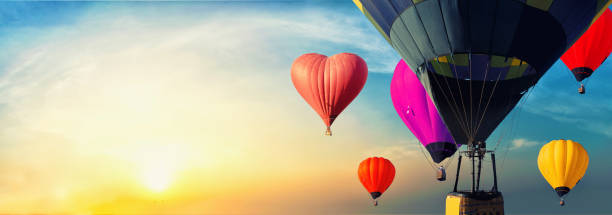 istock Colorful balloons floating in the sky at sunset. 1072504214
