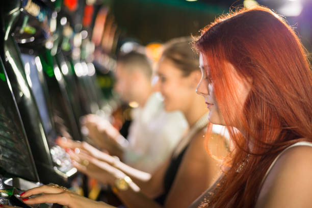 istock Playing Casino Slot Machines 1072504258