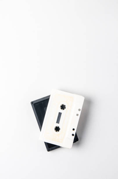 istock White and black audio cassettes on a light background. Place for text 1072505666