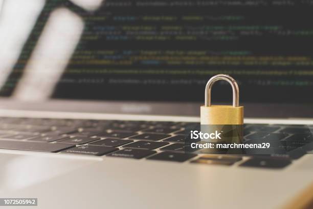 Protection Network Security Computer And Safe Your Data Concept Laptop Working Develop Coding Program With Key On Keyboard Stock Photo - Download Image Now