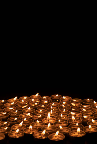 istock Candles in the dark 1072507902
