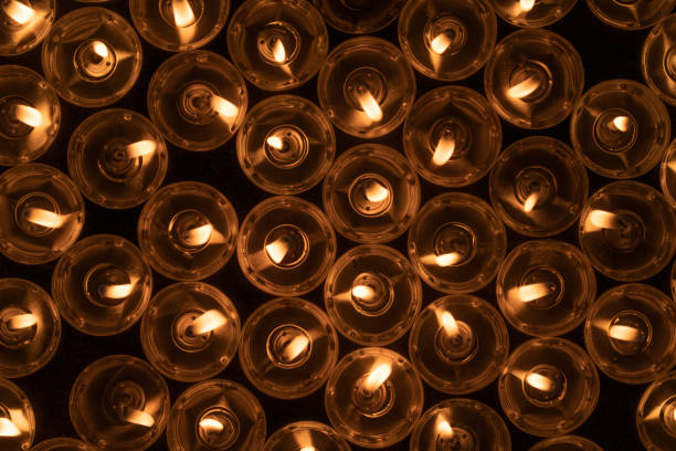 istock Candles in the dark 1072508238