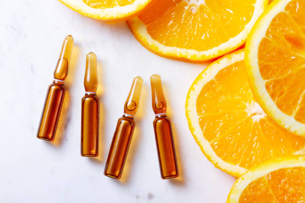 vitamin c concept - vitamin a letter a food orange imagens e fotografias de stock
