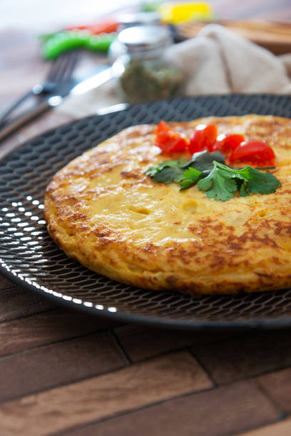 istock French Omelette with Potatoes, Mushroom and Salad 1072525608