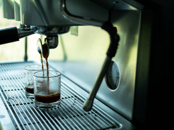 istock Close up of espresso machine making coffee in restaurant 1072531096