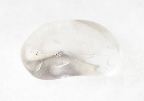 istock tumbled rock crystal ( quartz) stone on white 1072531320