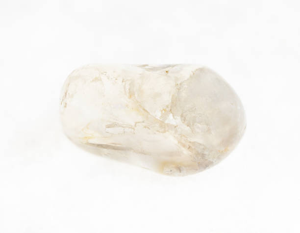 istock tumbled rock crystal ( quartz) gemstone on white 1072531328
