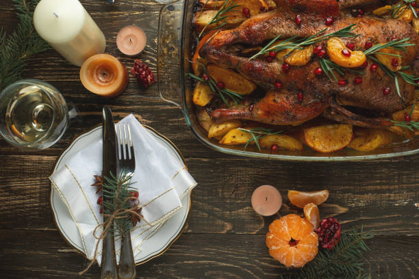 istock Festive dinner with candles, New Year's or Christmas table 1072532048