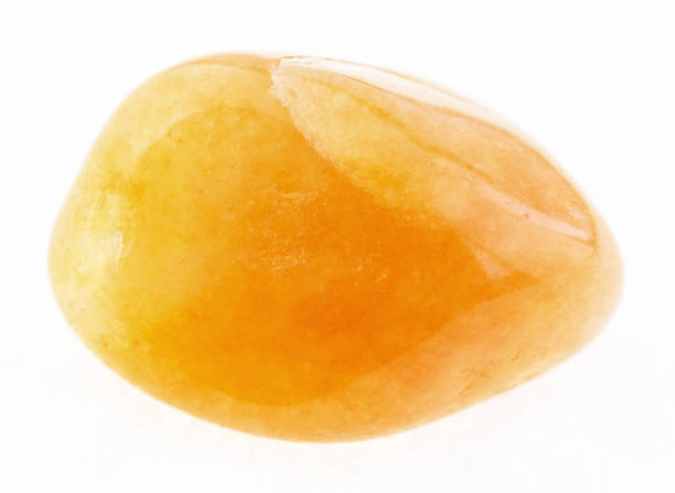 istock polished yellow aventurine stone on white 1072532754