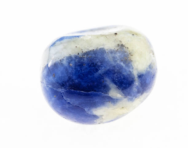 istock polished blue Sodalite gemstone on white 1072532860