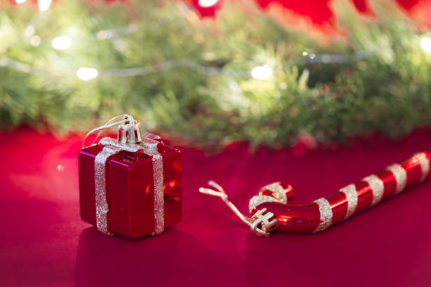 istock Christmas gift box with christmas balls, candy cane and candy. 1072534368