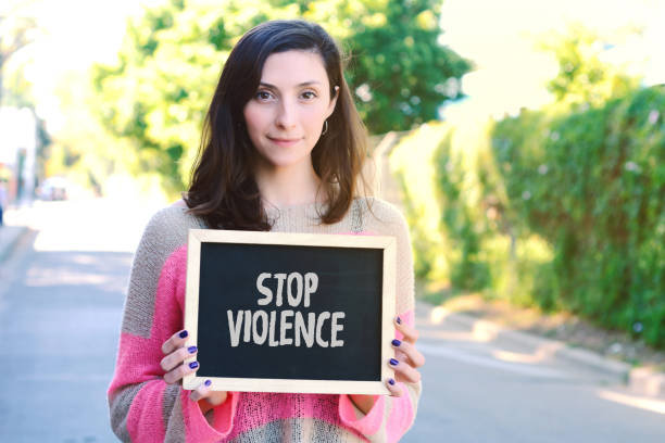 istock Woman holding chalkboard with 