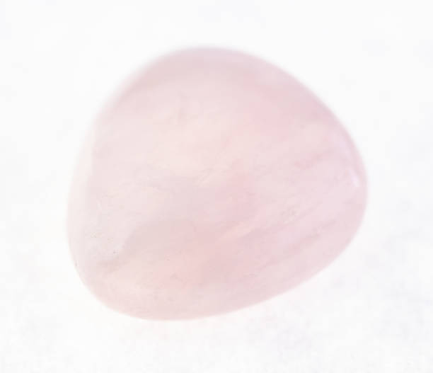 istock polished pink (rose) quartz gemstone on white 1072535756