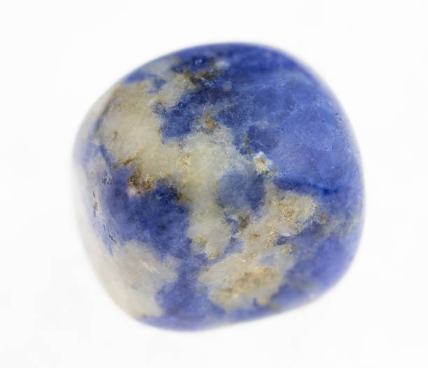 istock tumbled blue Sodalite stone on white 1072535872