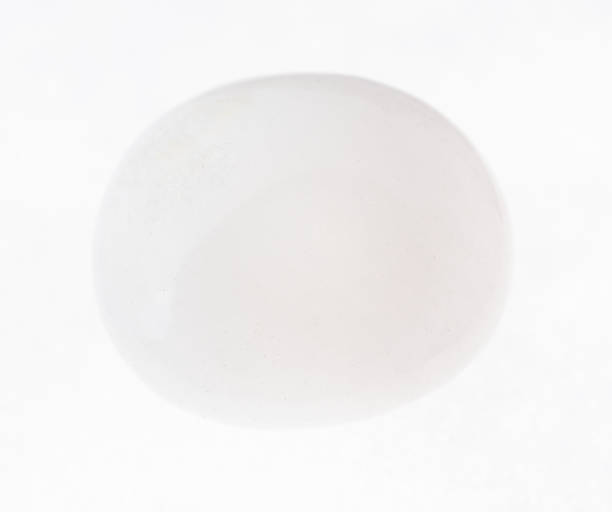 istock tumbled milky quartz gemstone on white 1072535932