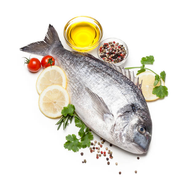 istock Sea bream and ingredients for seasoning and cooking fish 1072536324