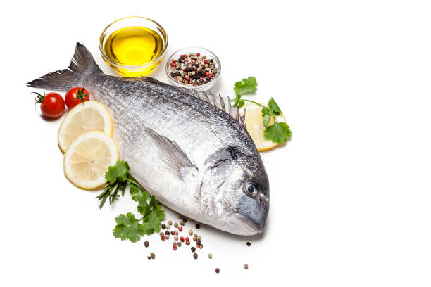 istock Sea bream and ingredients for seasoning and cooking fish 1072536326