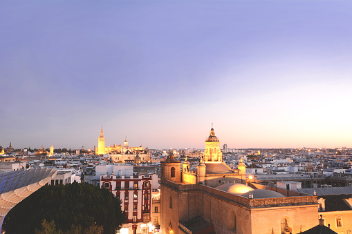 Beautiful cityscape of Seville at sunset from the roof of Metropolitan Parasol, Spain.