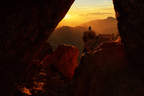 enjoying amazing landscape - climbing men sea cliff imagens e fotografias de stock