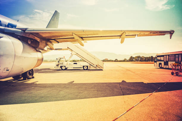 Airport with airplane at sunset