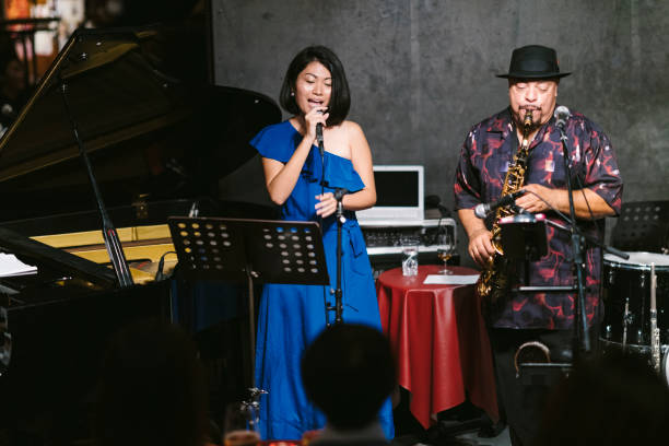istock Multi-ethnic jazz music group performing at stage 1072539896